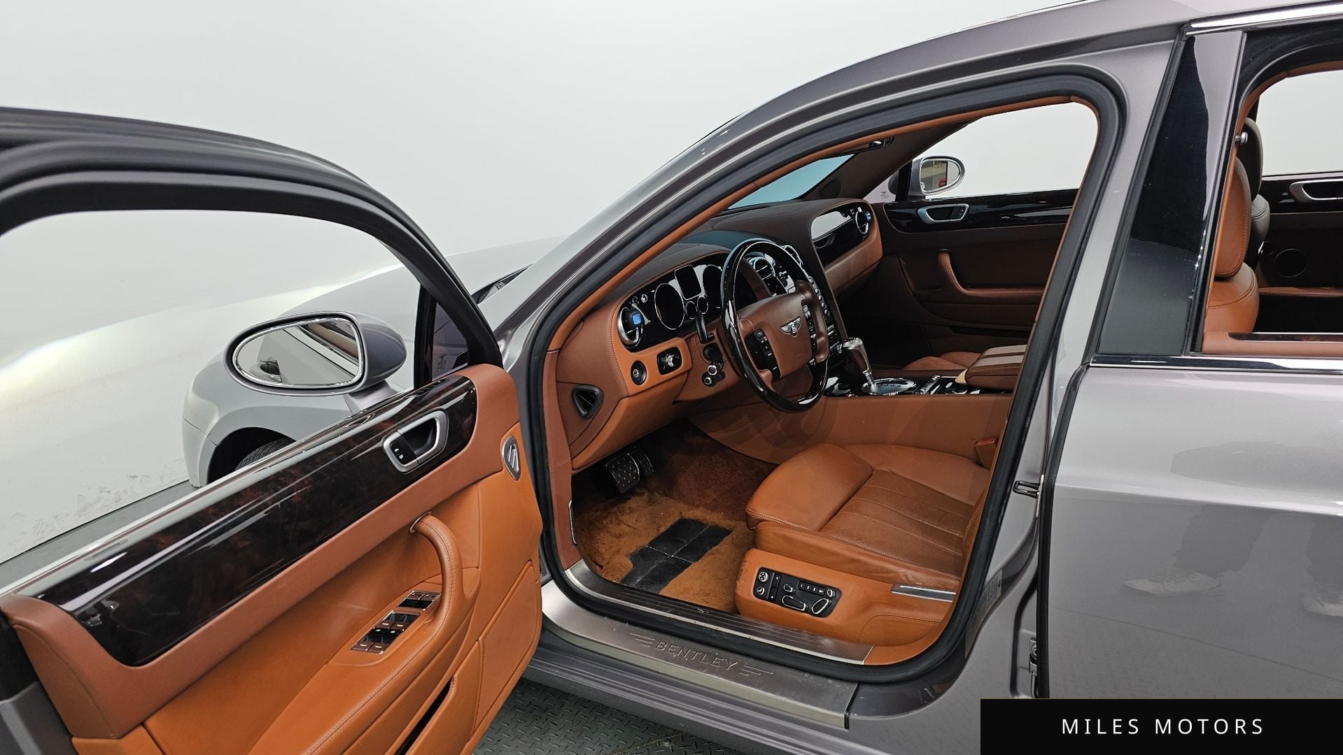 Bentley 플라잉스퍼 2009 — миниатюра 10