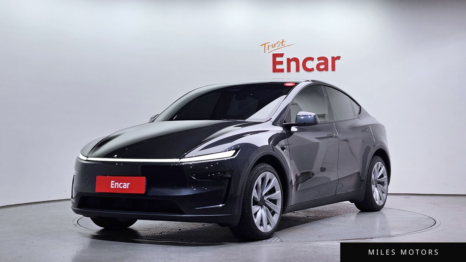Tesla Model Y 2025 — фото 1 из 12