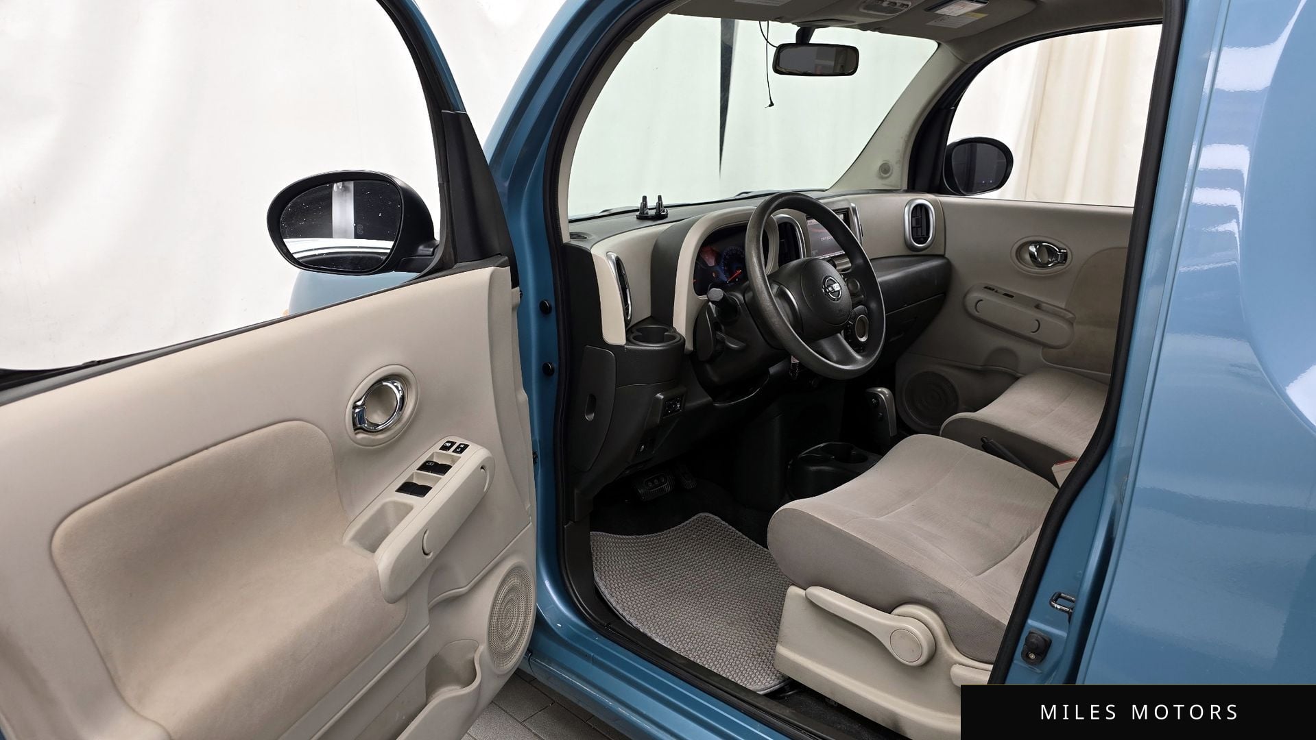 Nissan Cube 2011 — миниатюра 10
