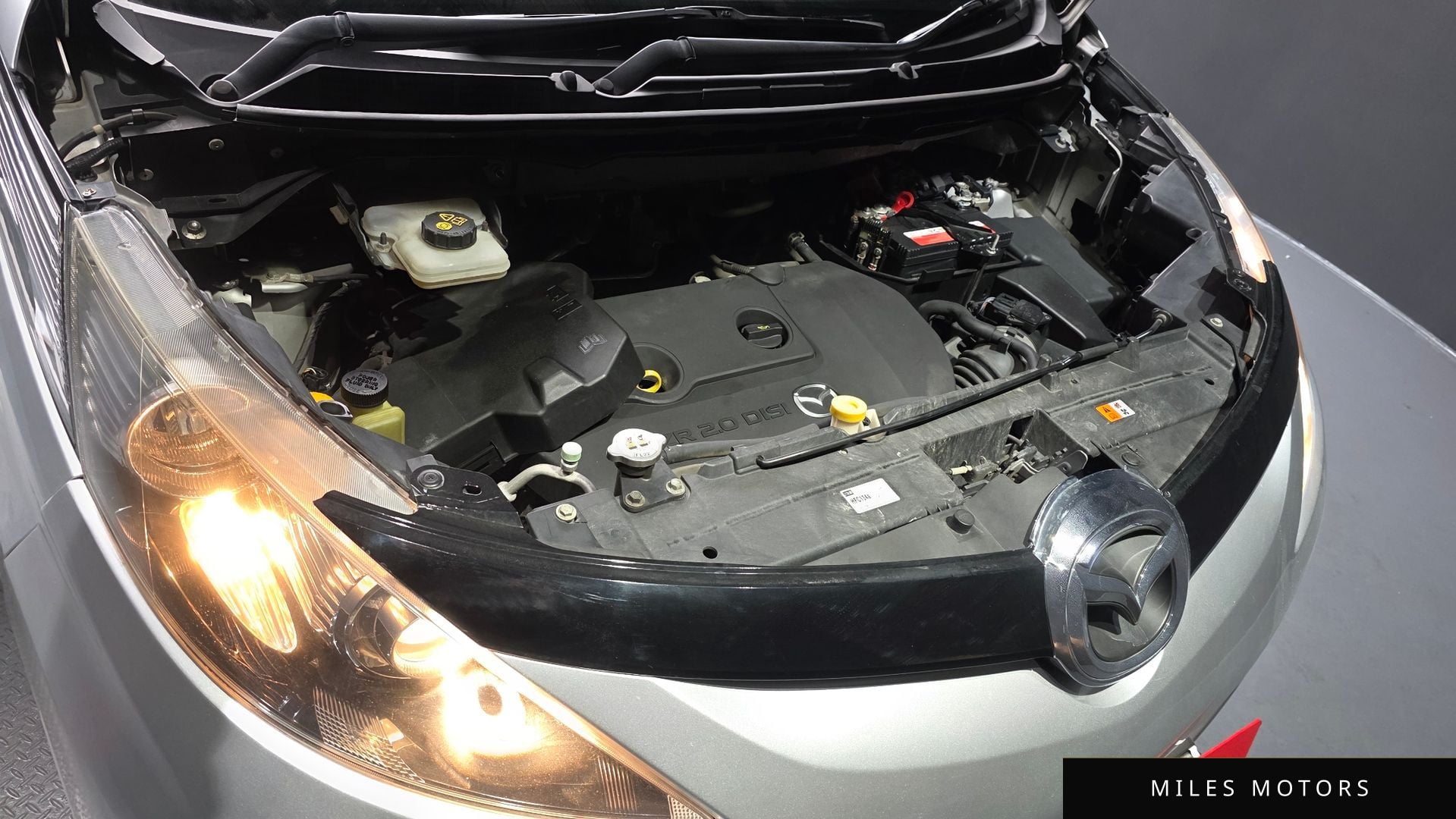 Mazda 비안테 2010 — миниатюра 6