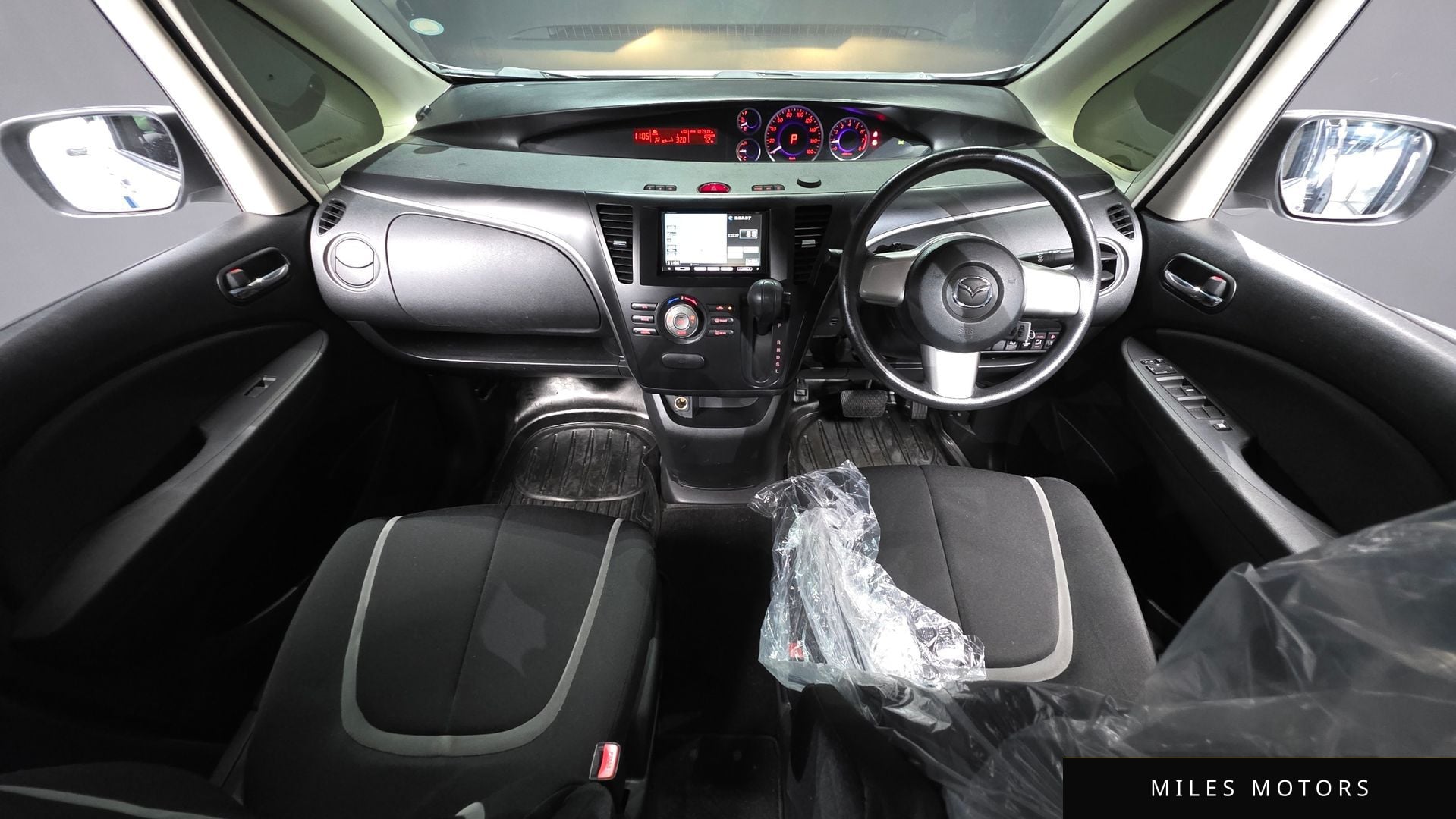 Mazda 비안테 2010 — миниатюра 7