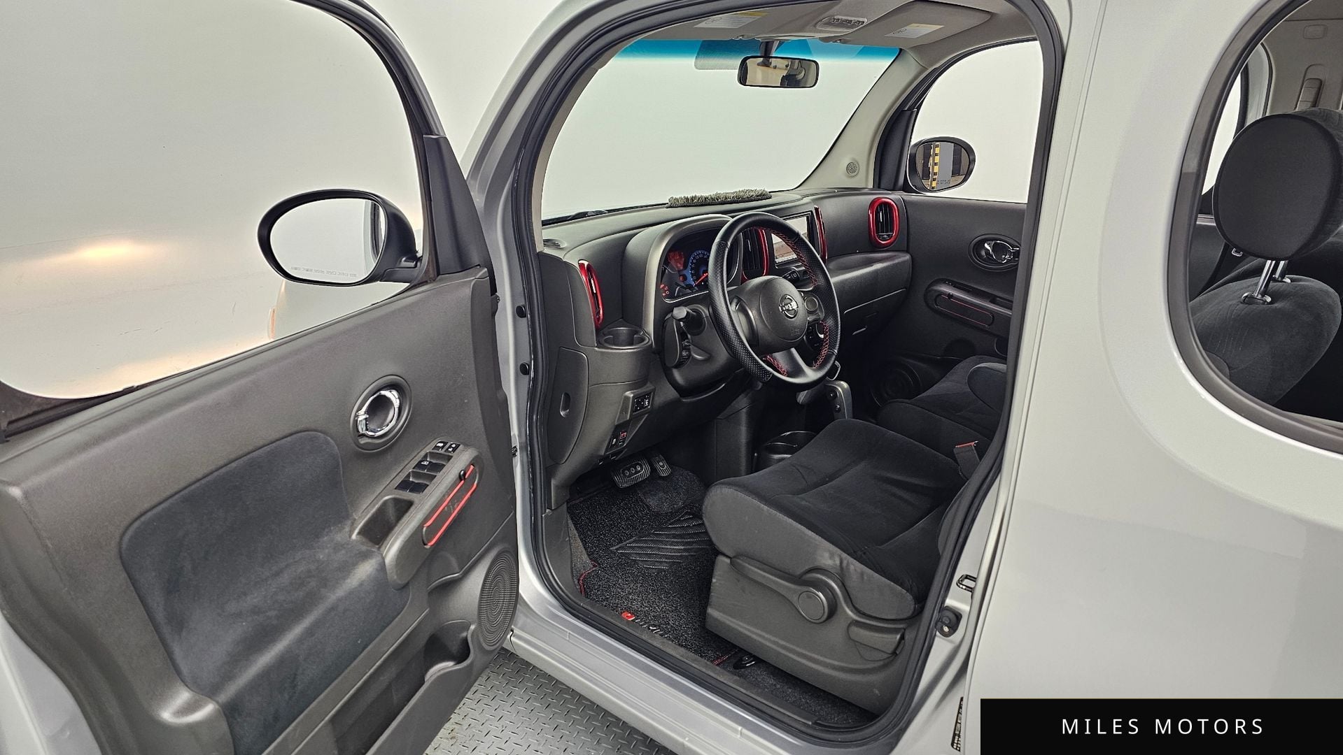 Nissan 큐브 2011 — миниатюра 11