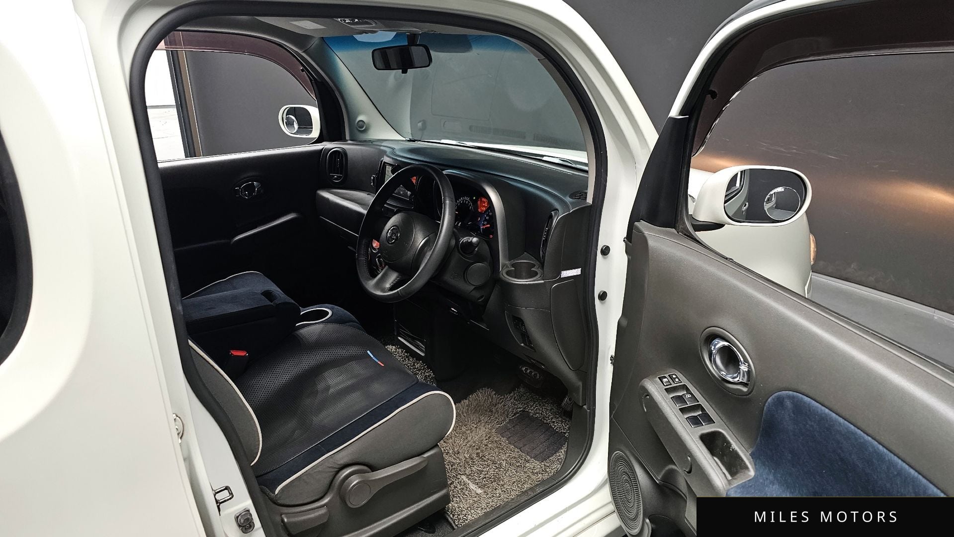 Nissan Cube 2010 — миниатюра 12