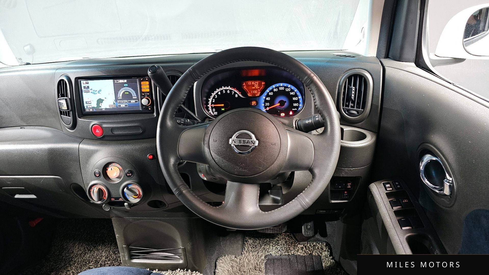 Nissan Cube 2010 — миниатюра 13