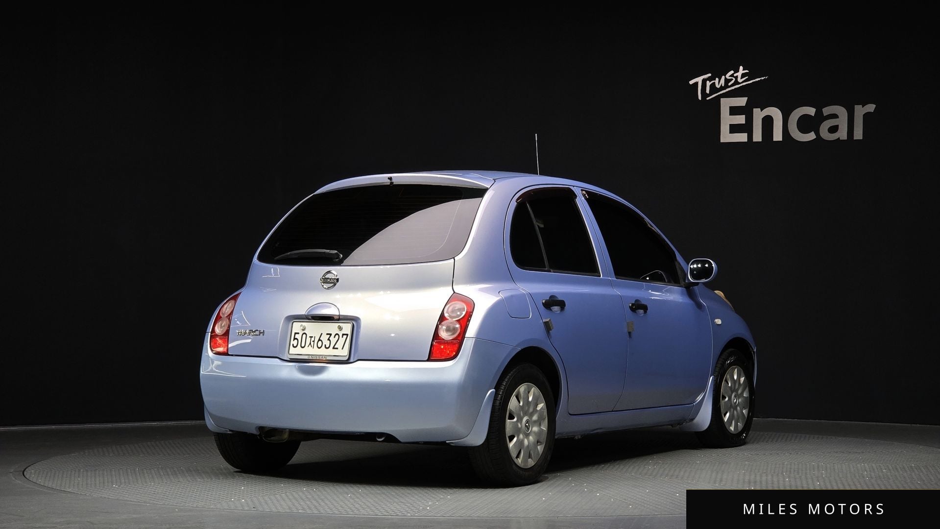 Nissan 마치 2002 — миниатюра 2