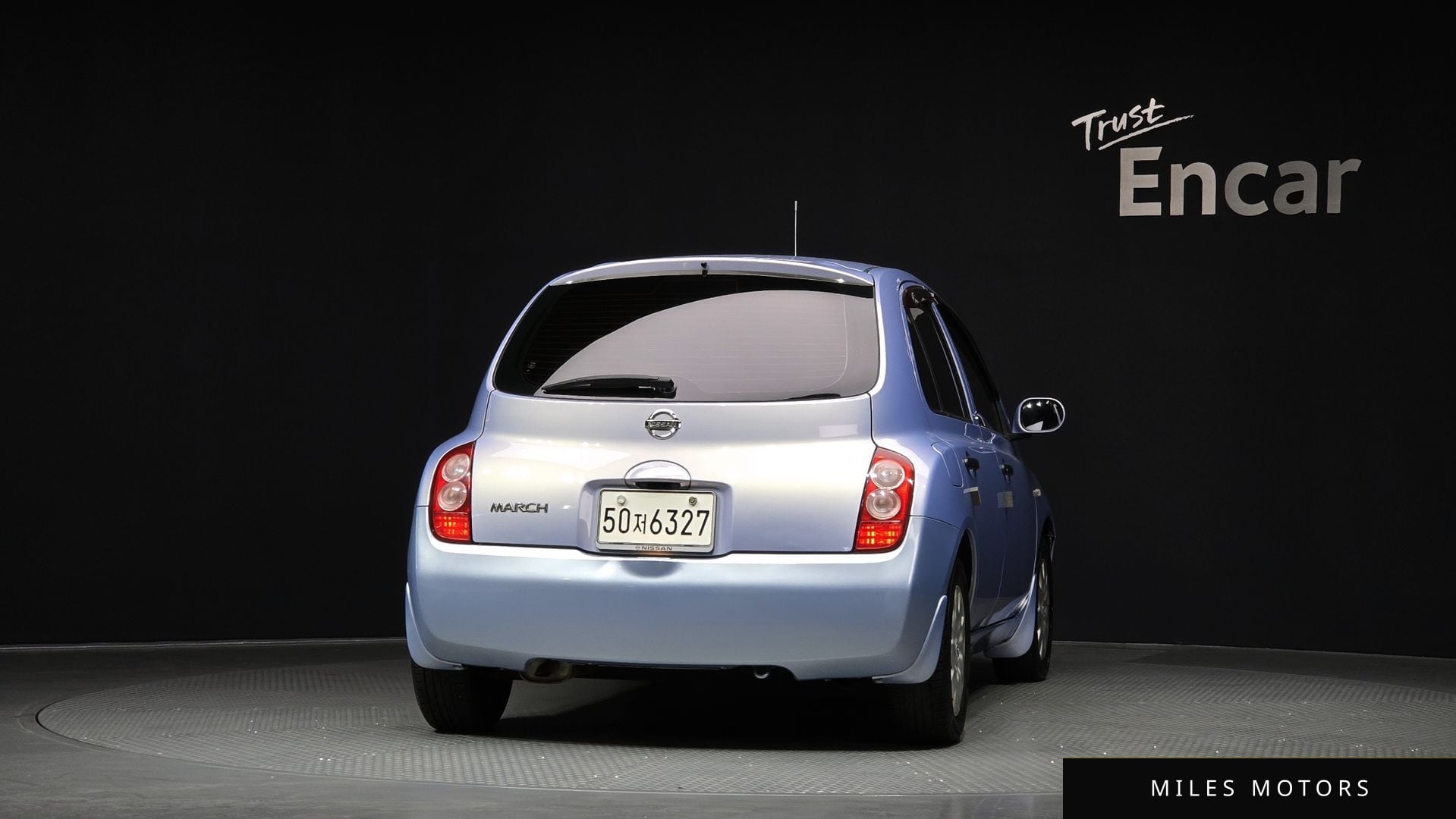 Nissan 마치 2002 — миниатюра 4