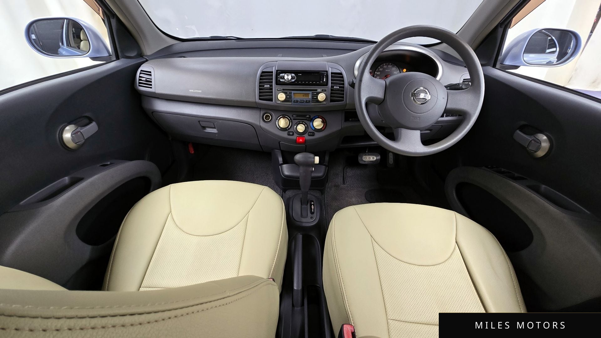 Nissan 마치 2002 — миниатюра 7