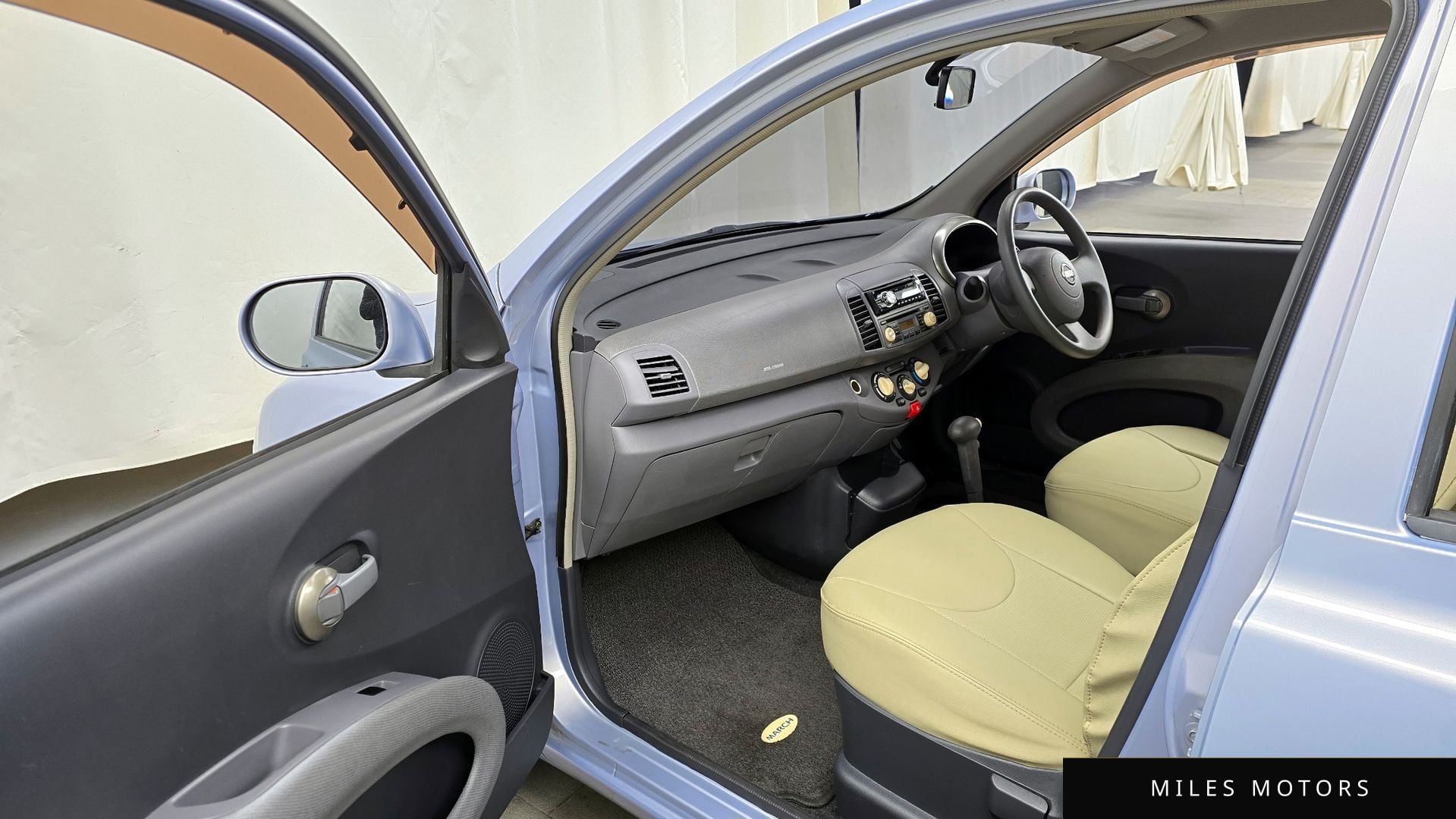 Nissan 마치 2002 — миниатюра 10