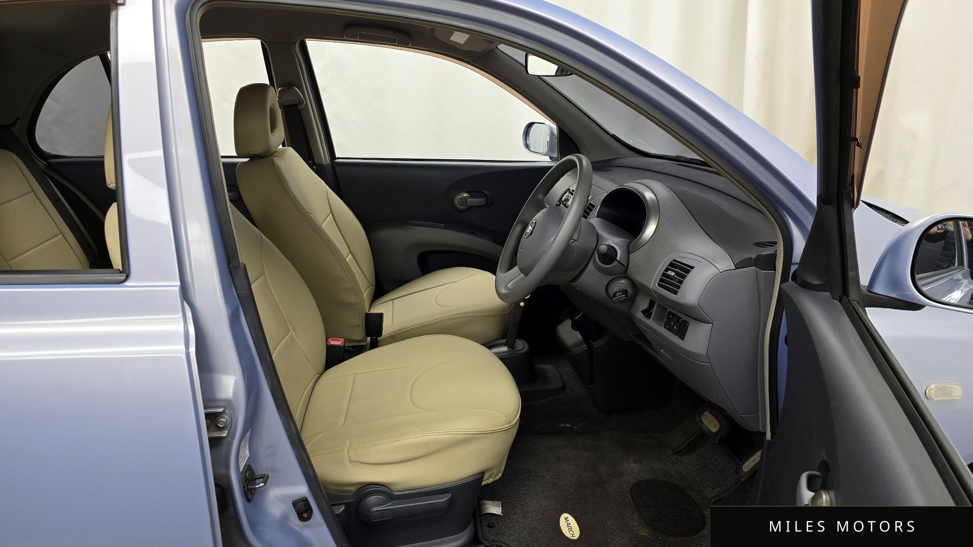Nissan 마치 2002 — миниатюра 11