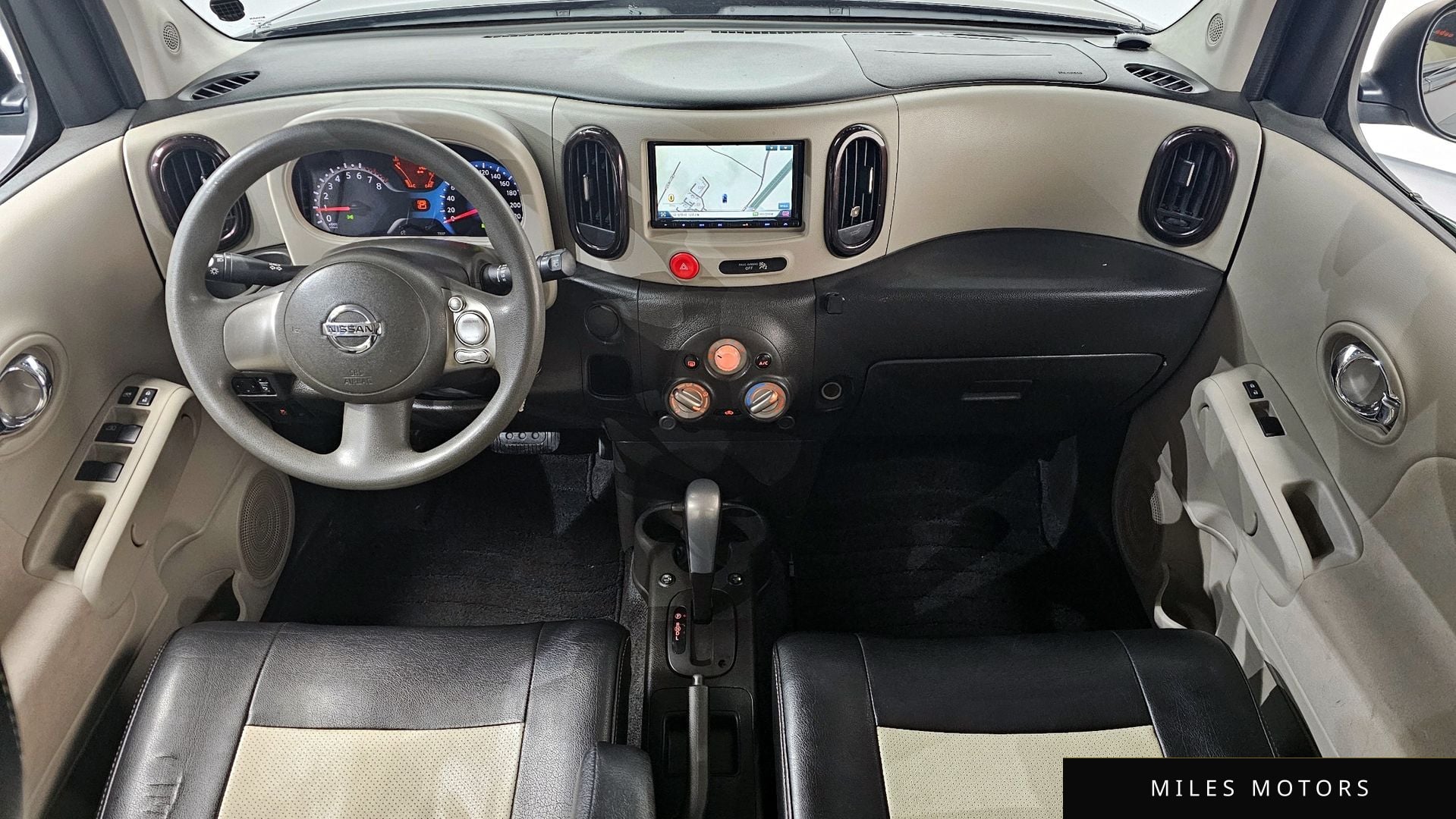 Nissan Cube 2011 — миниатюра 7