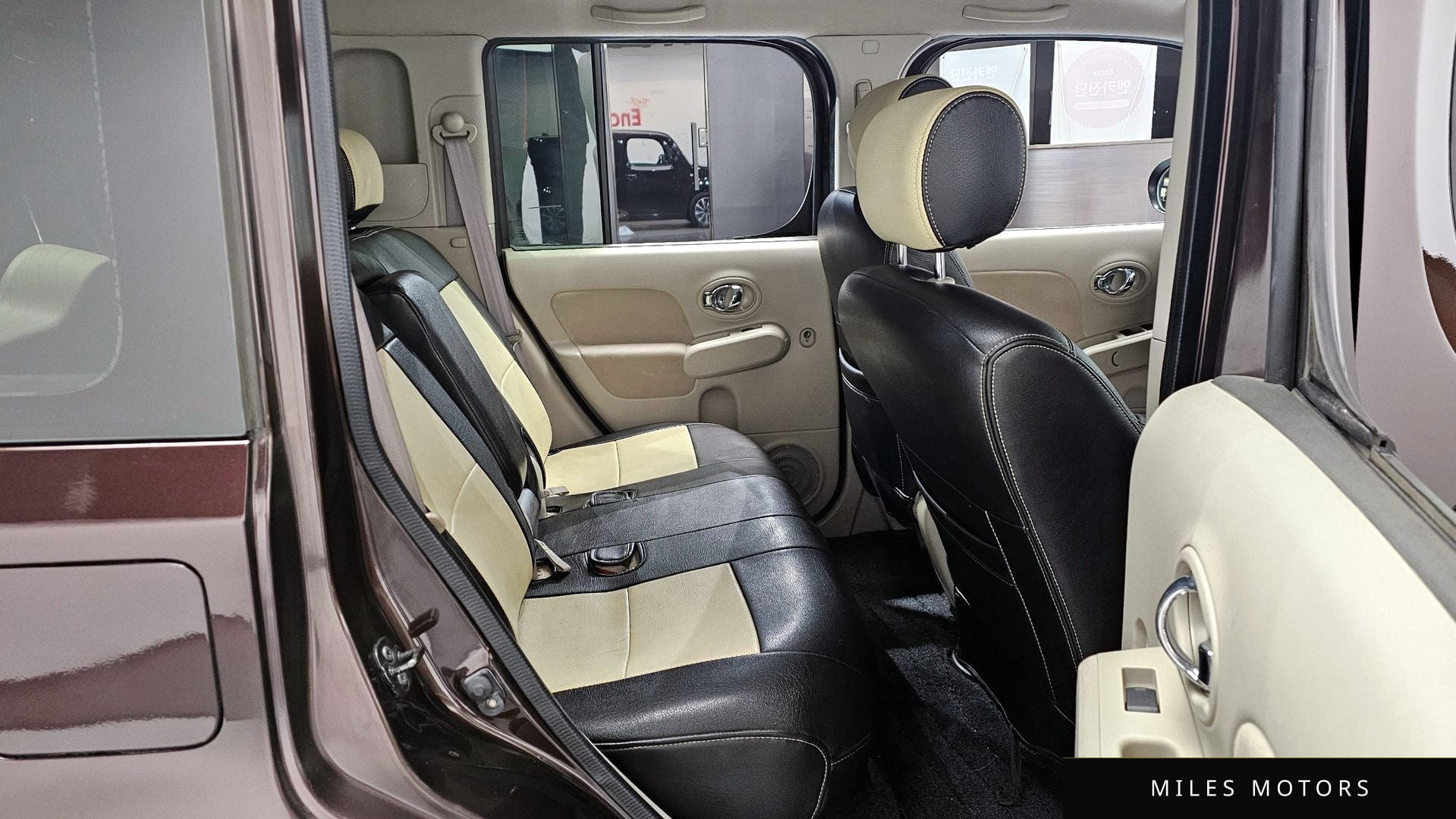 Nissan Cube 2011 — миниатюра 12