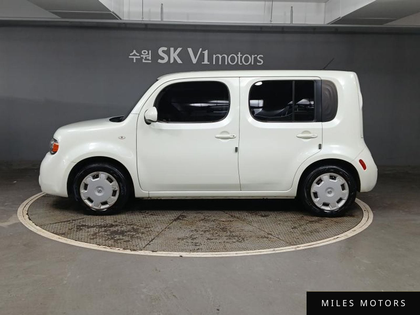 Nissan Cube 2011 — миниатюра 2