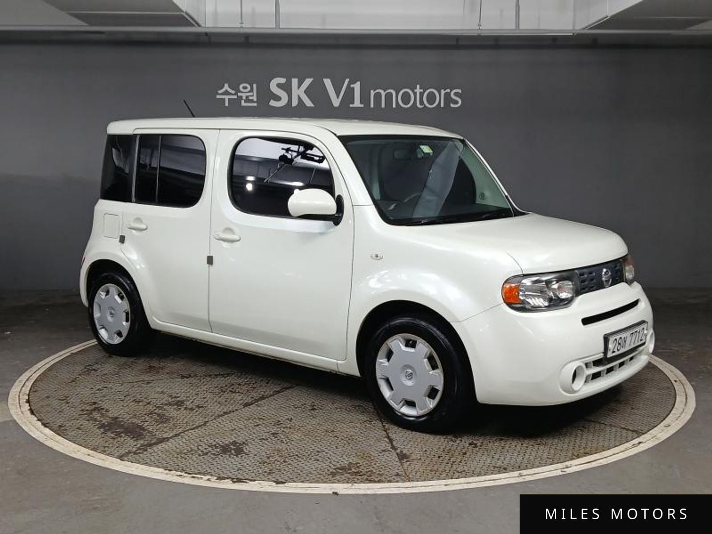 Nissan Cube 2011 — миниатюра 3
