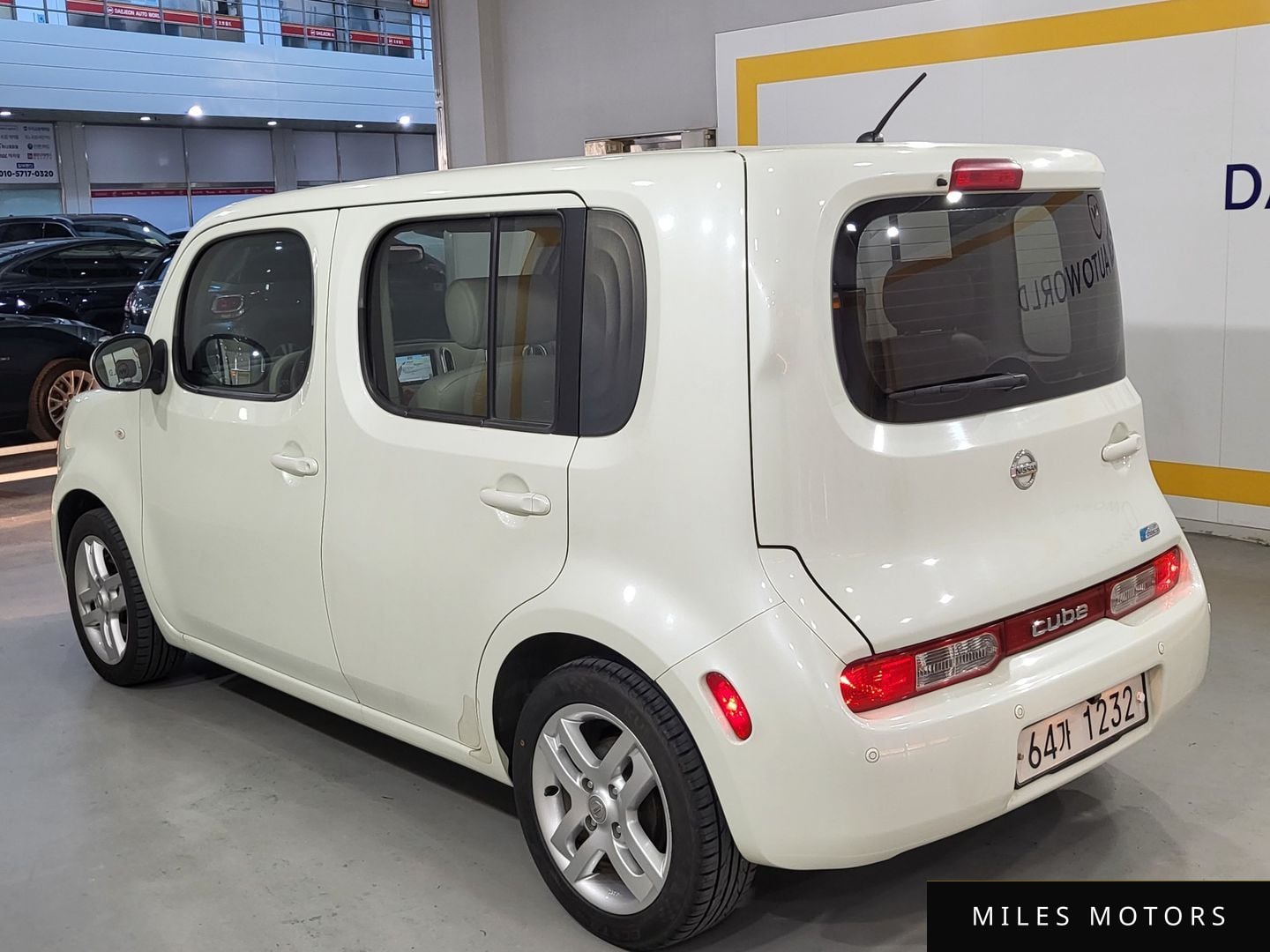 Nissan Cube 2011 — миниатюра 2