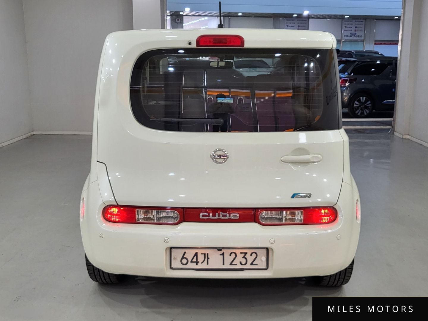 Nissan Cube 2011 — миниатюра 4