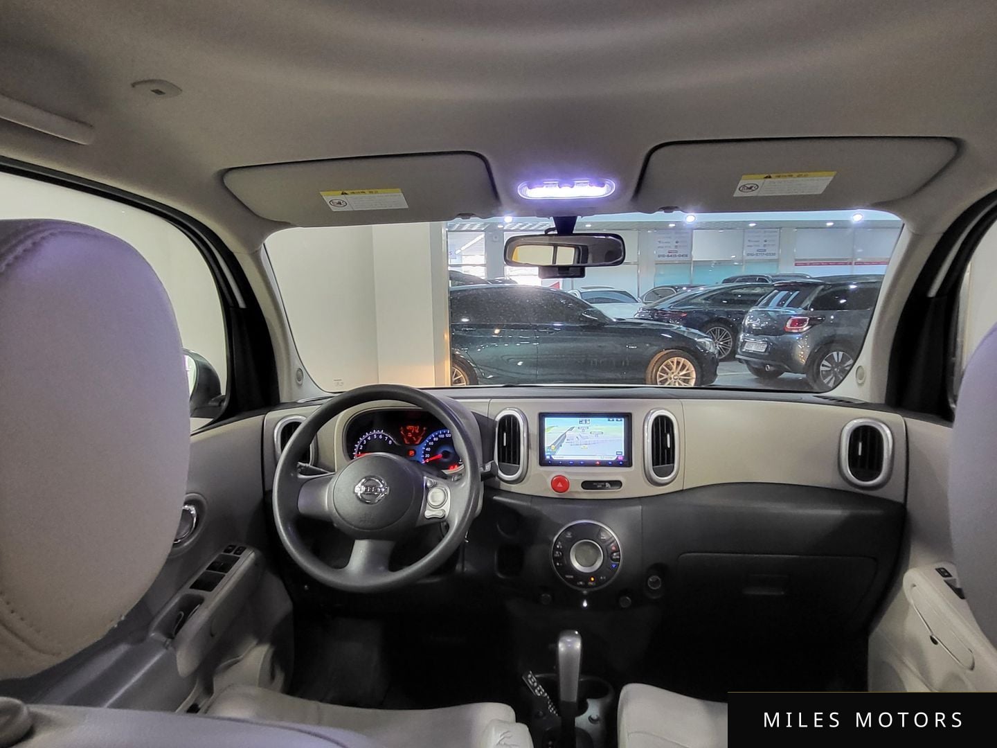 Nissan Cube 2011 — миниатюра 7