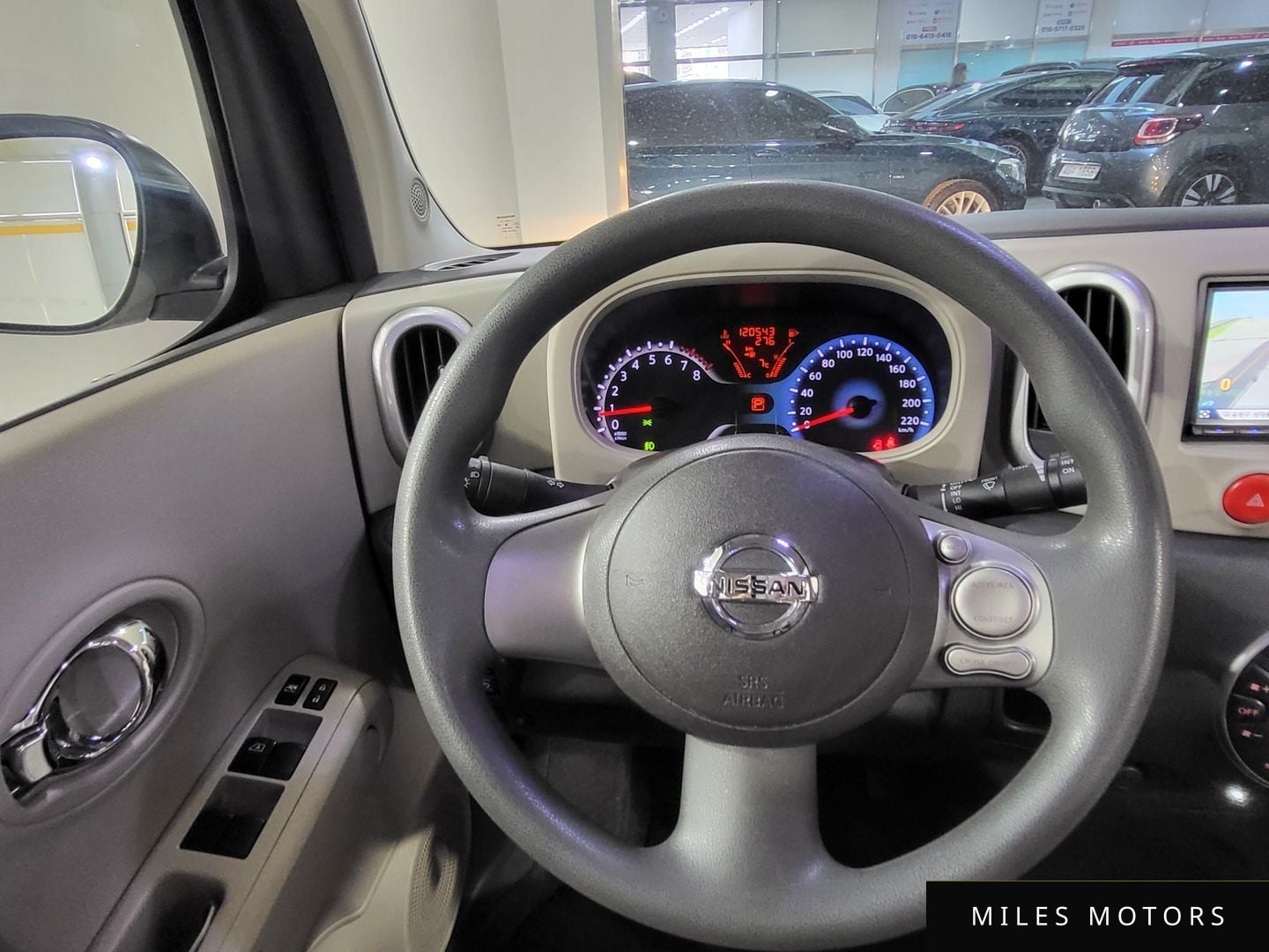 Nissan Cube 2011 — миниатюра 8