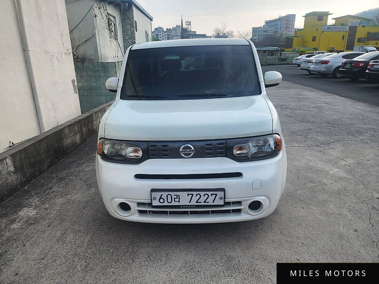 Nissan 큐브 2011 — миниатюра 2