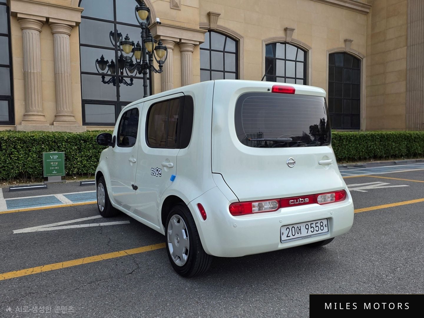 Nissan 큐브 2011 — миниатюра 2