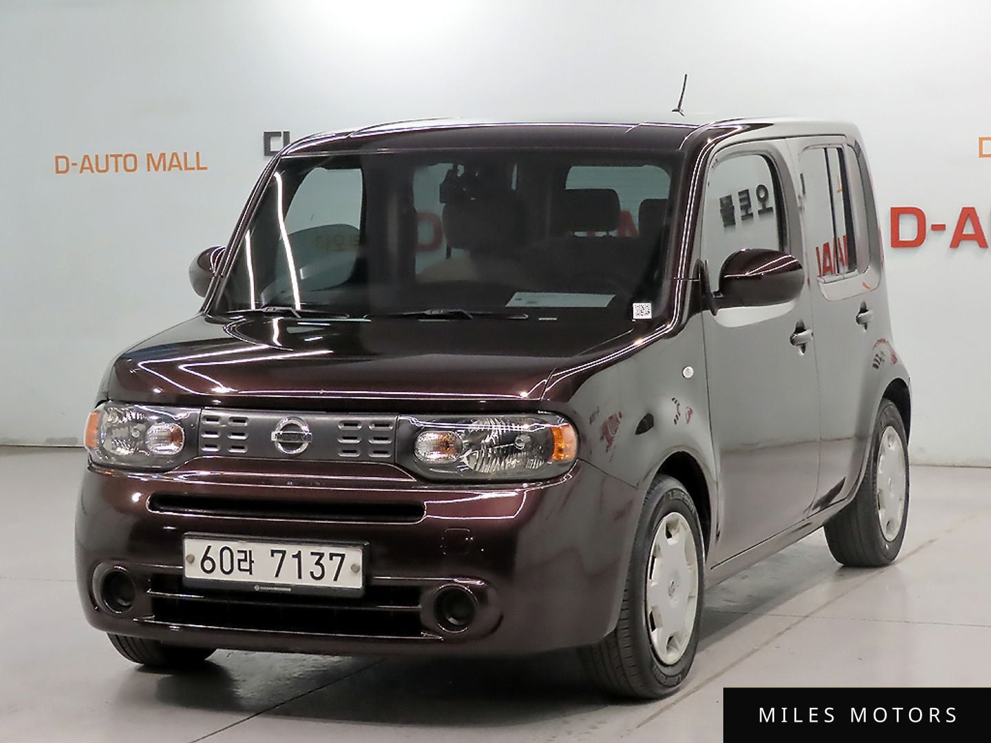 Nissan 큐브 2011 — миниатюра 2
