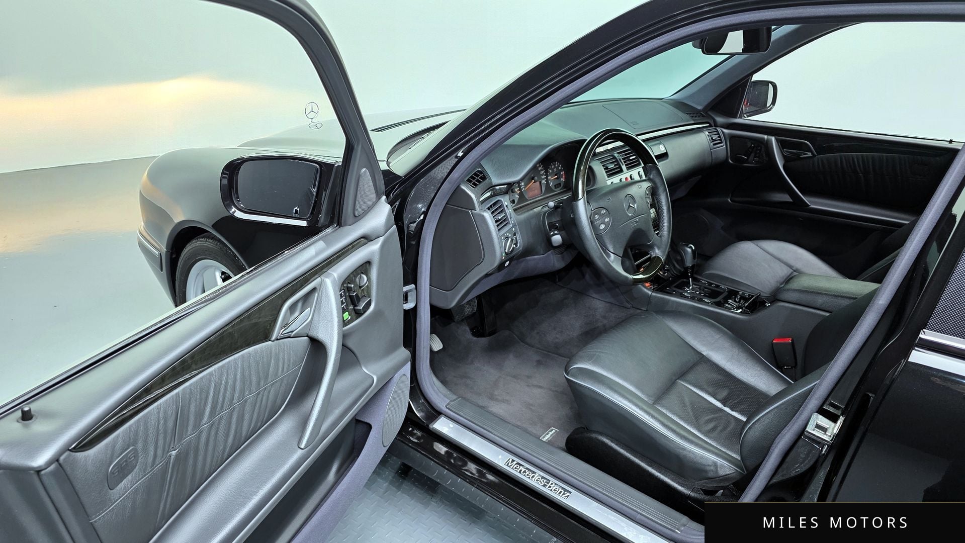 Mercedes-Benz E-Class W210 2002 — миниатюра 10