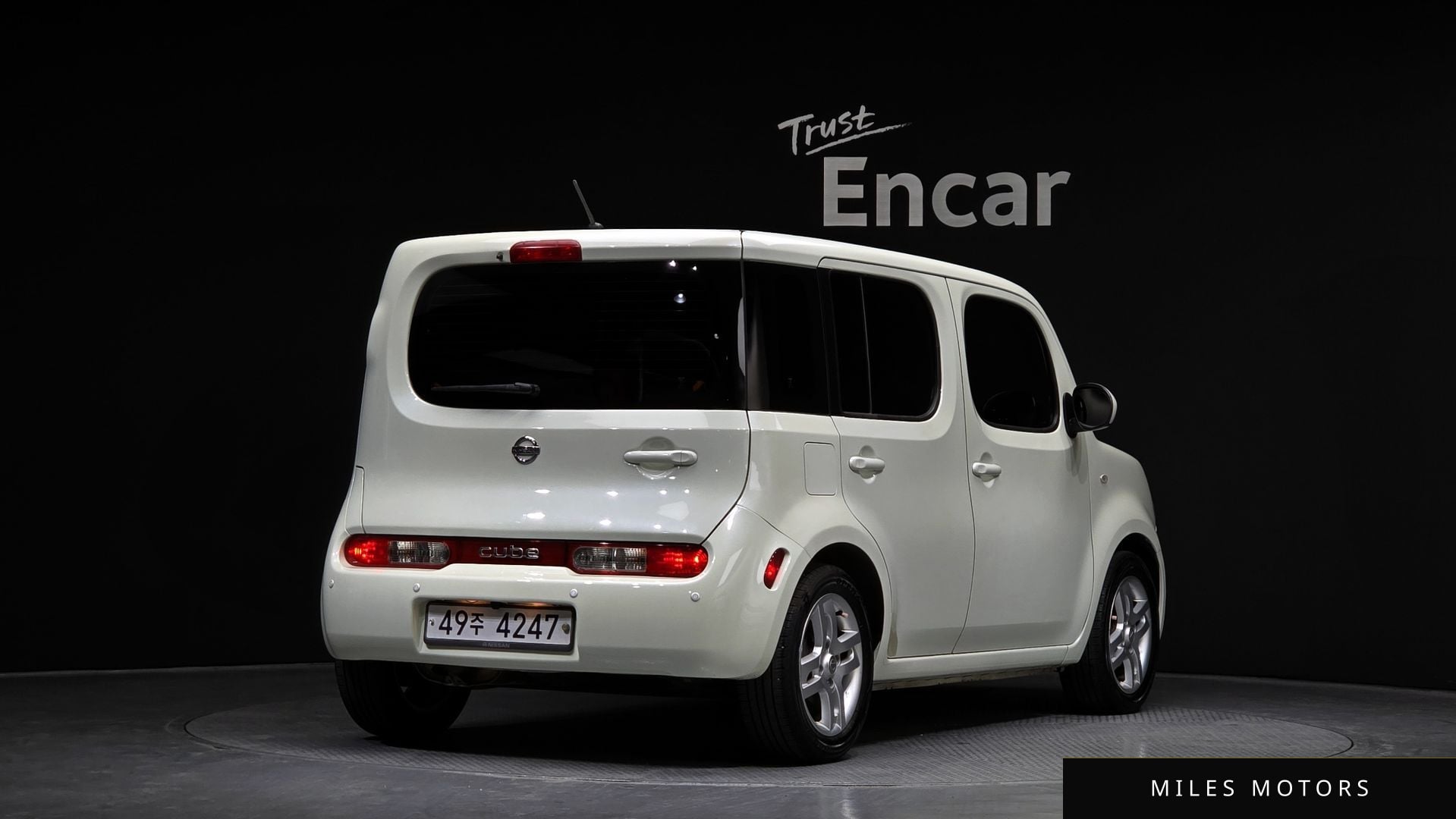 Nissan 큐브 2011 — миниатюра 2