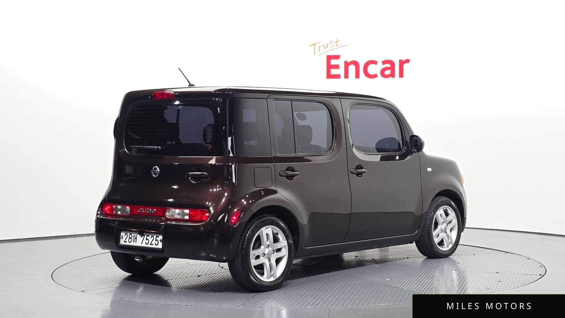 Nissan 큐브 2011 — миниатюра 2