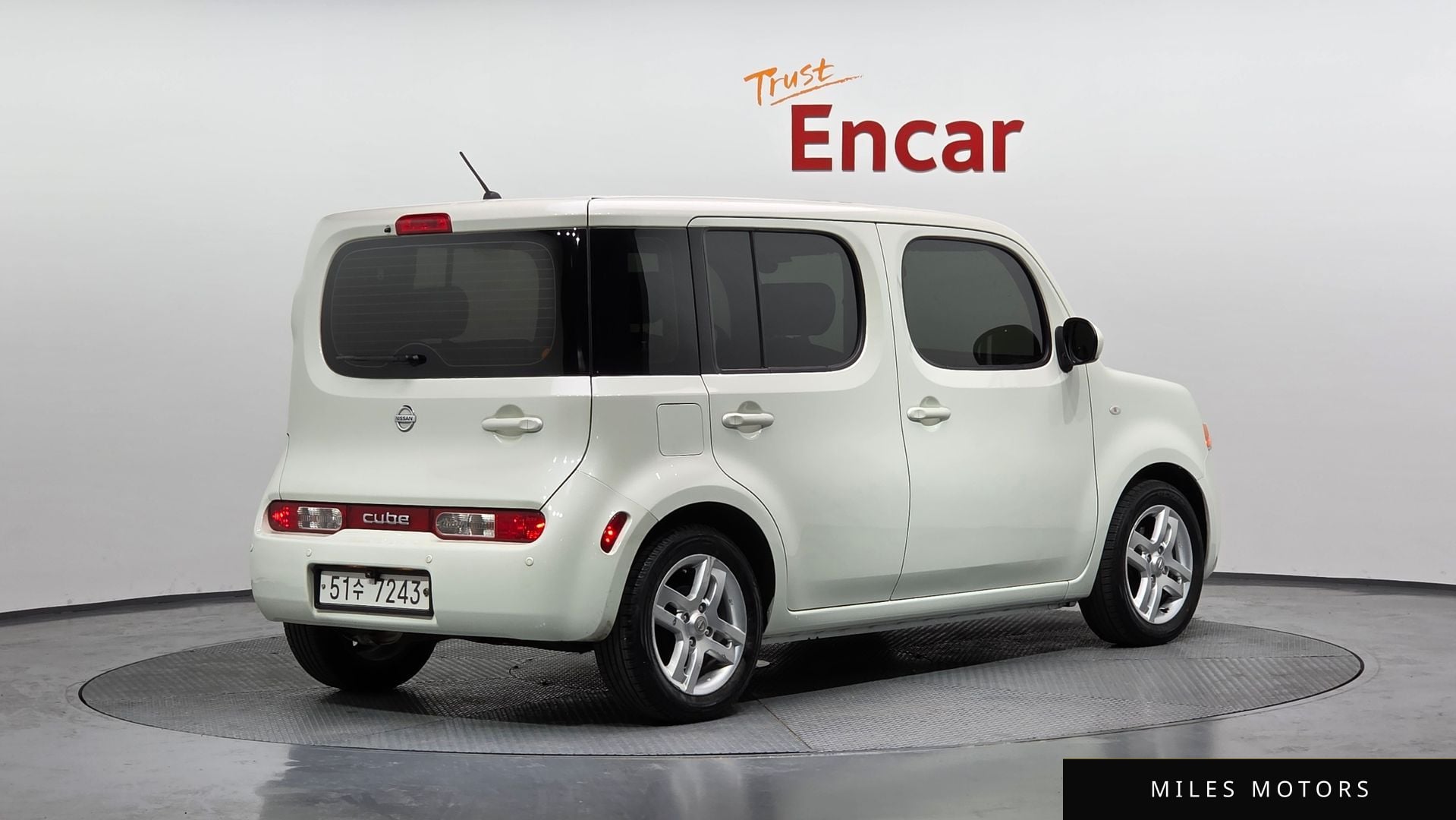 Nissan 큐브 2011 — миниатюра 2