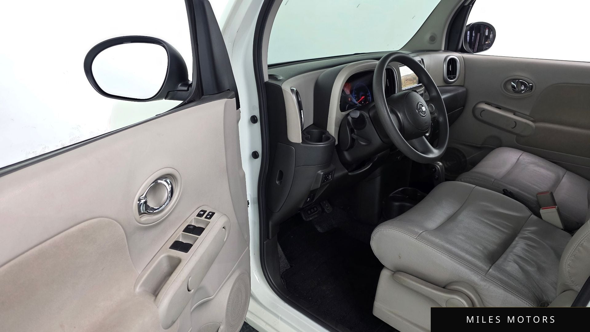 Nissan 큐브 2011 — миниатюра 10