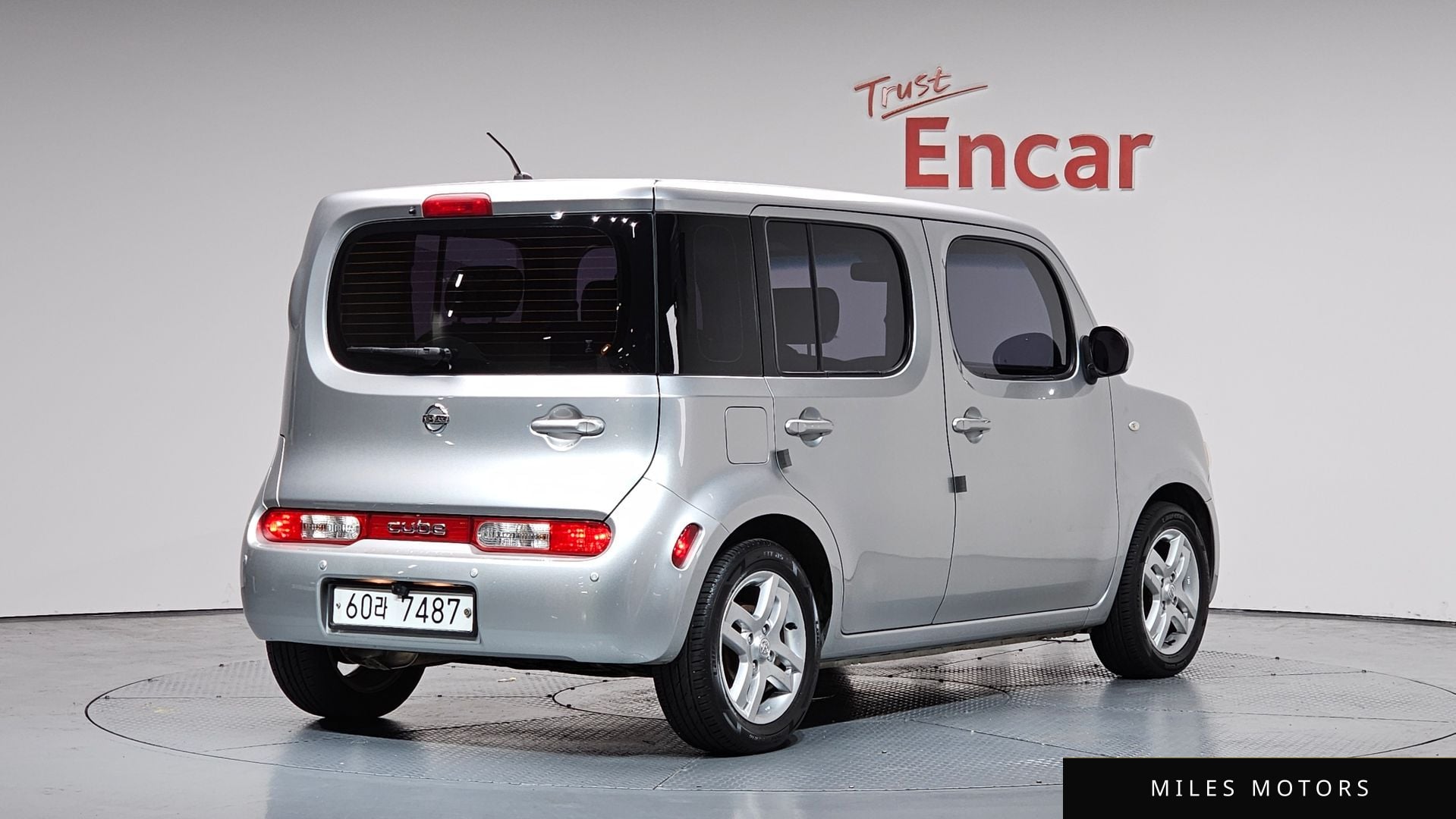 Nissan 큐브 2011 — миниатюра 2