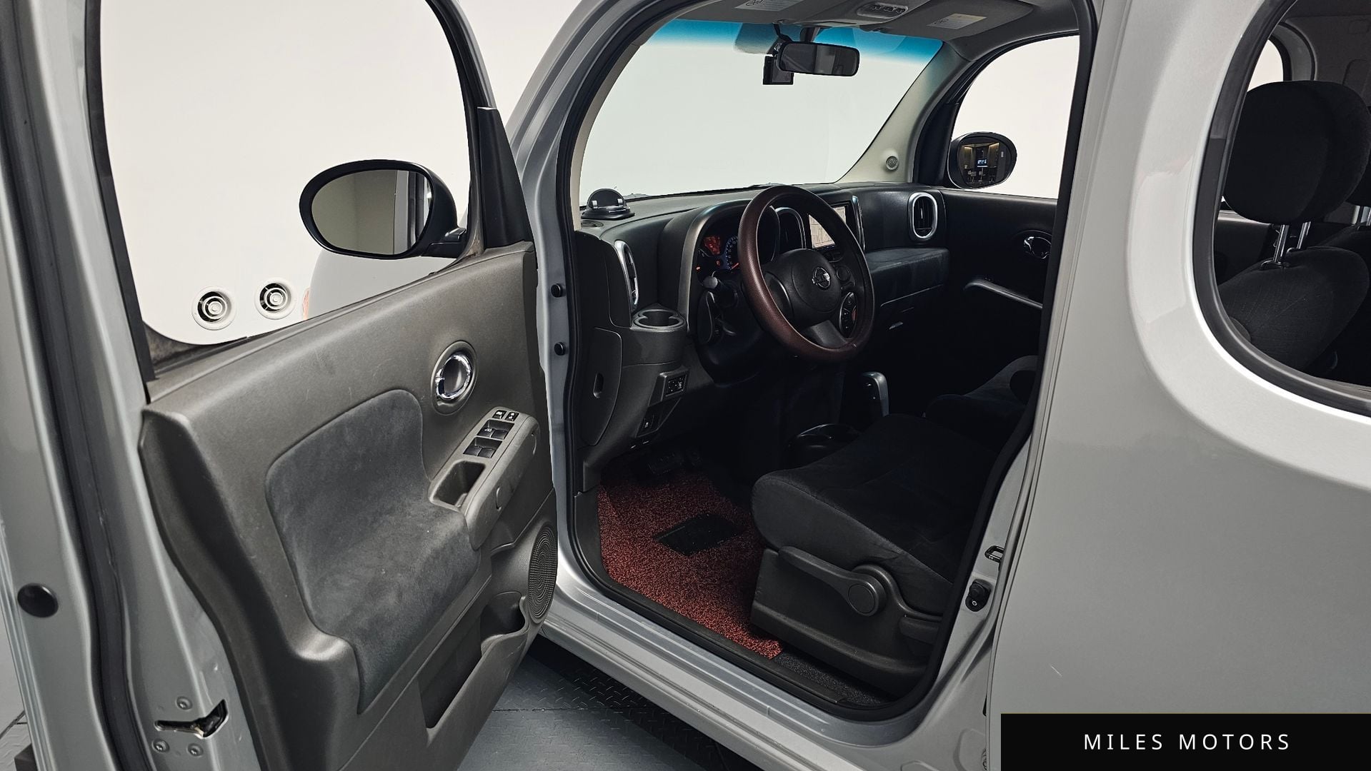 Nissan 큐브 2011 — миниатюра 10