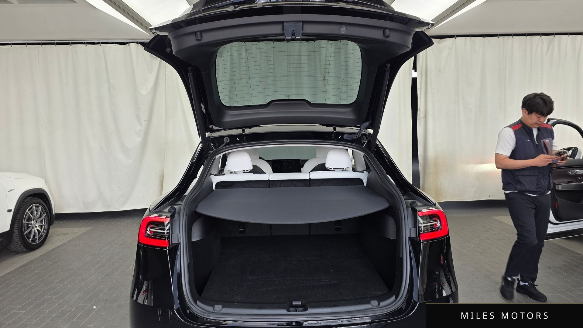 Tesla Model Y 2024 — миниатюра 20