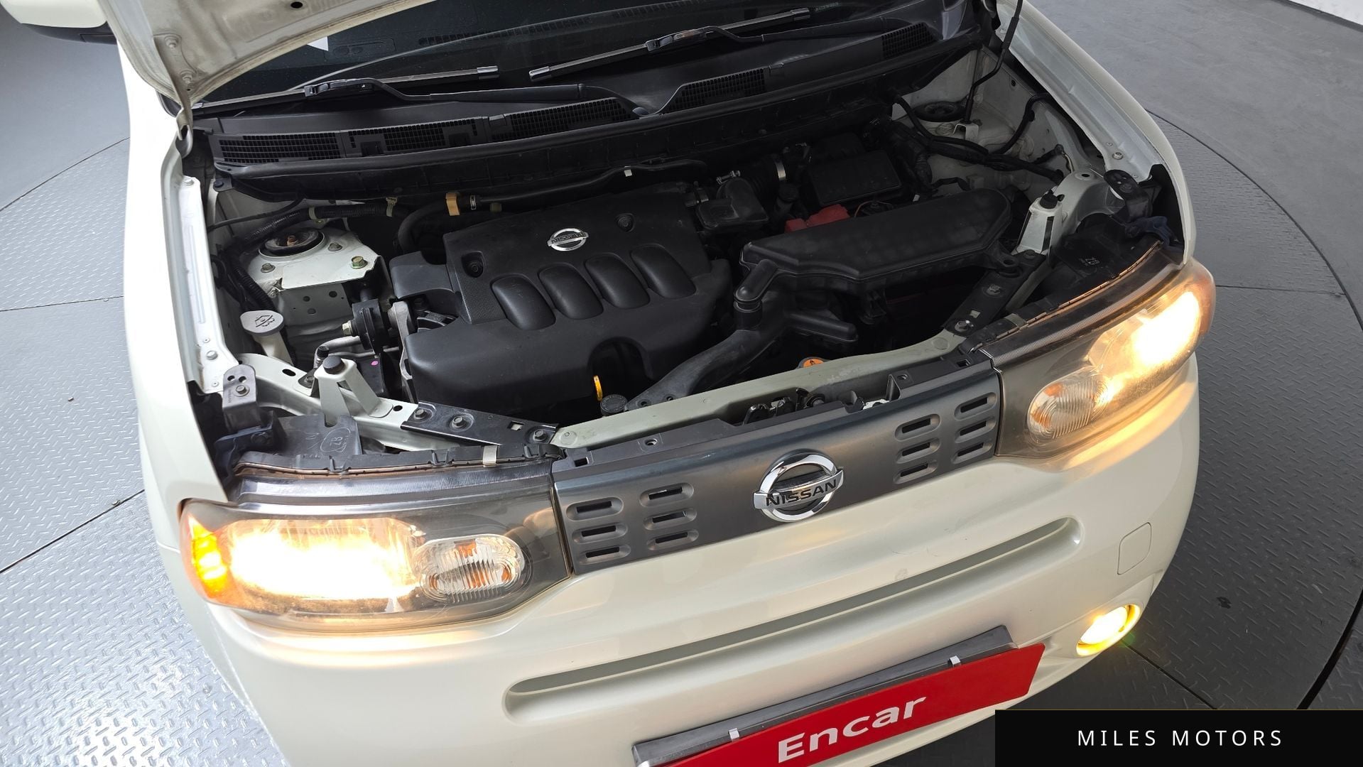 Nissan Cube 2011 — миниатюра 6