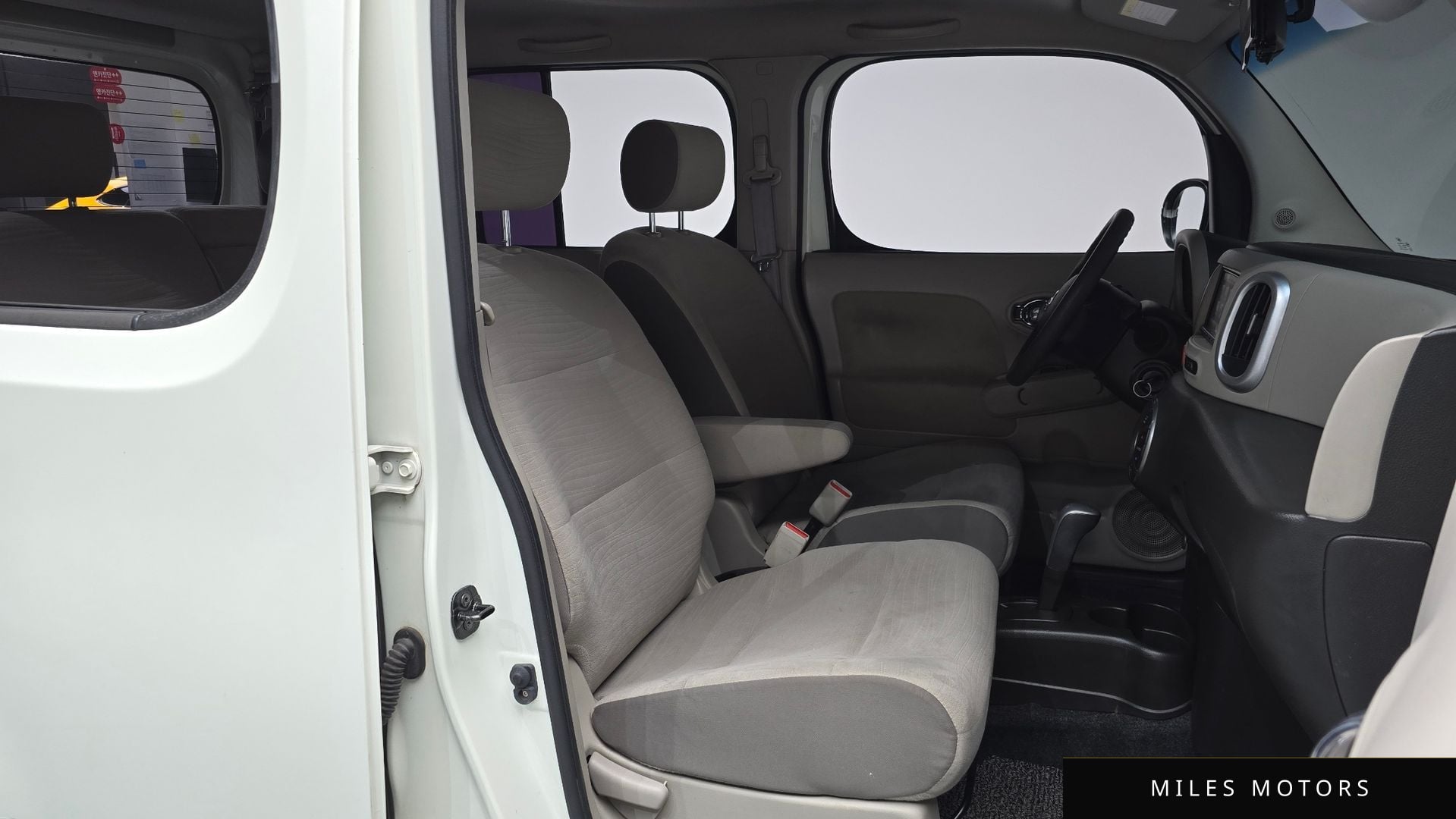 Nissan Cube 2011 — миниатюра 11