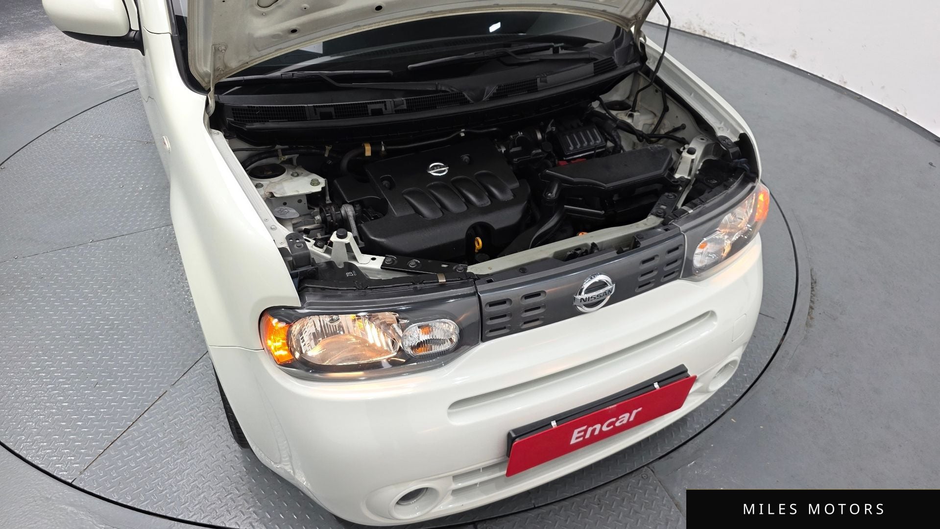 Nissan Cube 2011 — миниатюра 6
