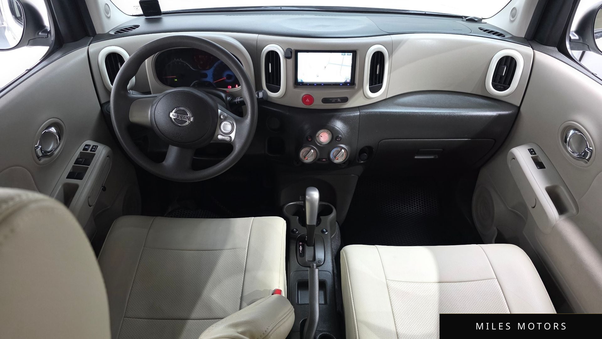 Nissan Cube 2011 — миниатюра 7
