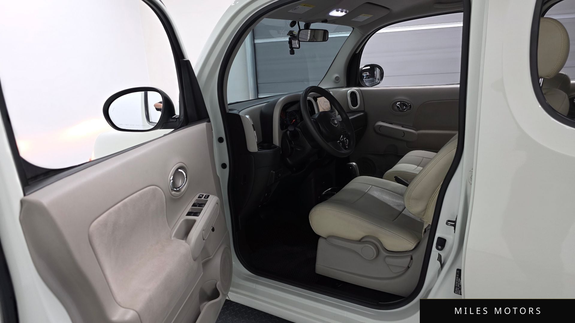 Nissan Cube 2011 — миниатюра 10