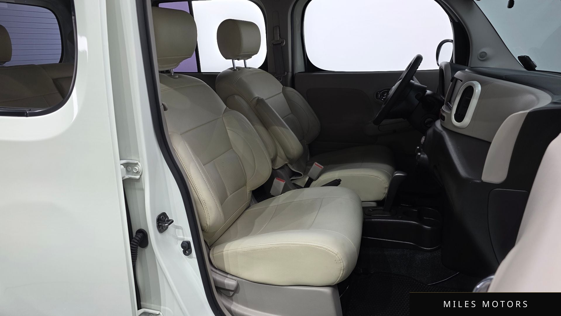 Nissan Cube 2011 — миниатюра 11