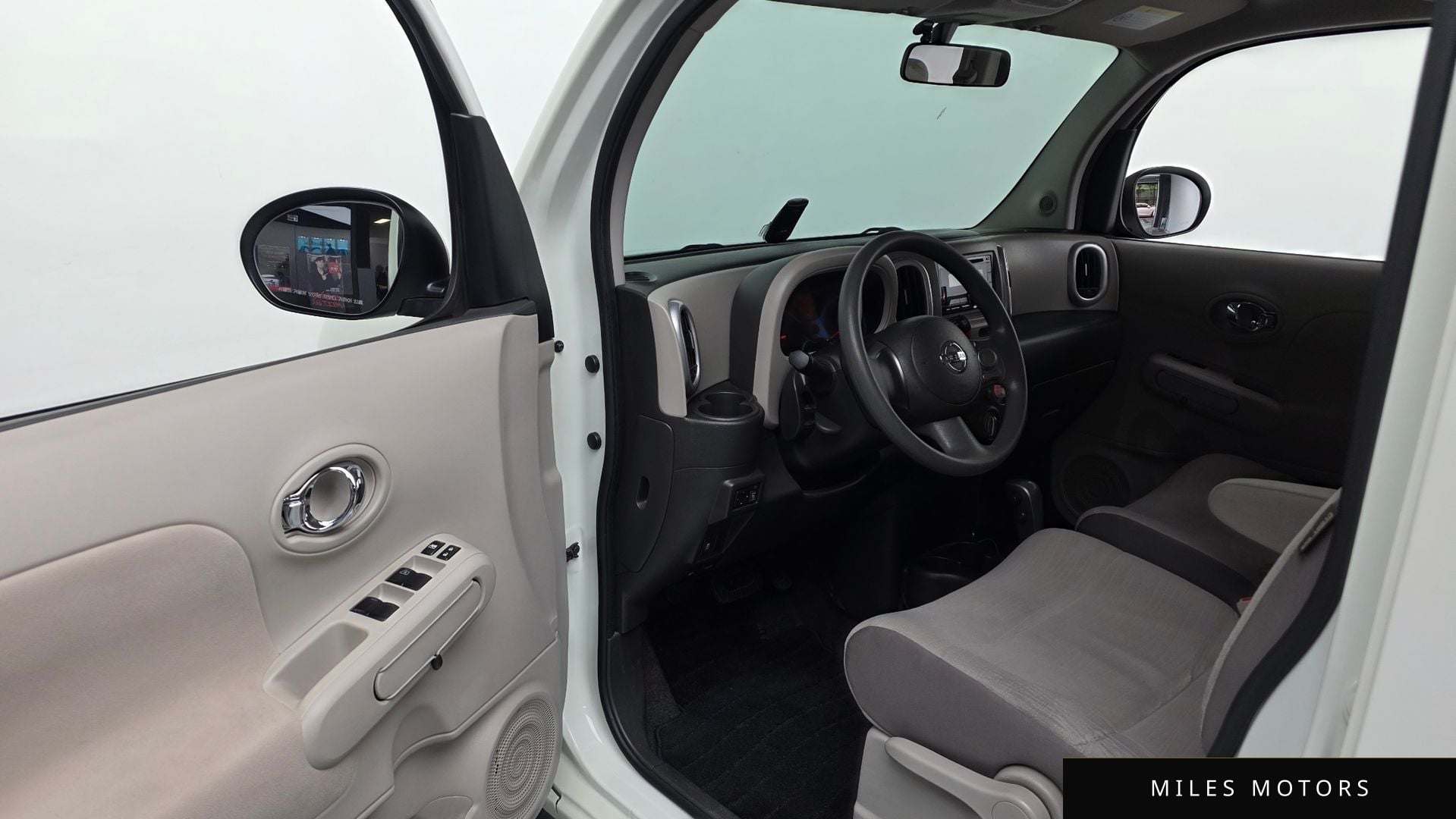 Nissan Cube 2011 — миниатюра 10
