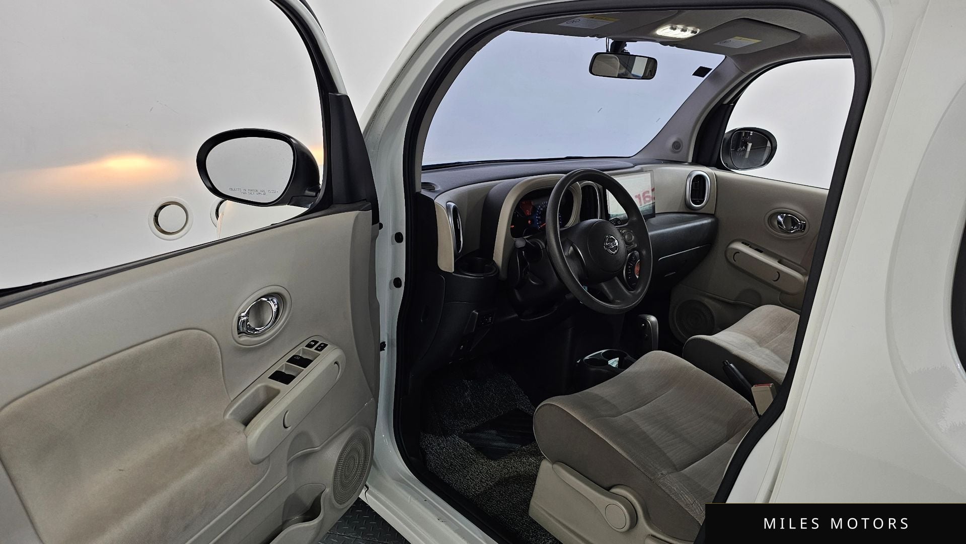 Nissan Cube 2013 — миниатюра 10