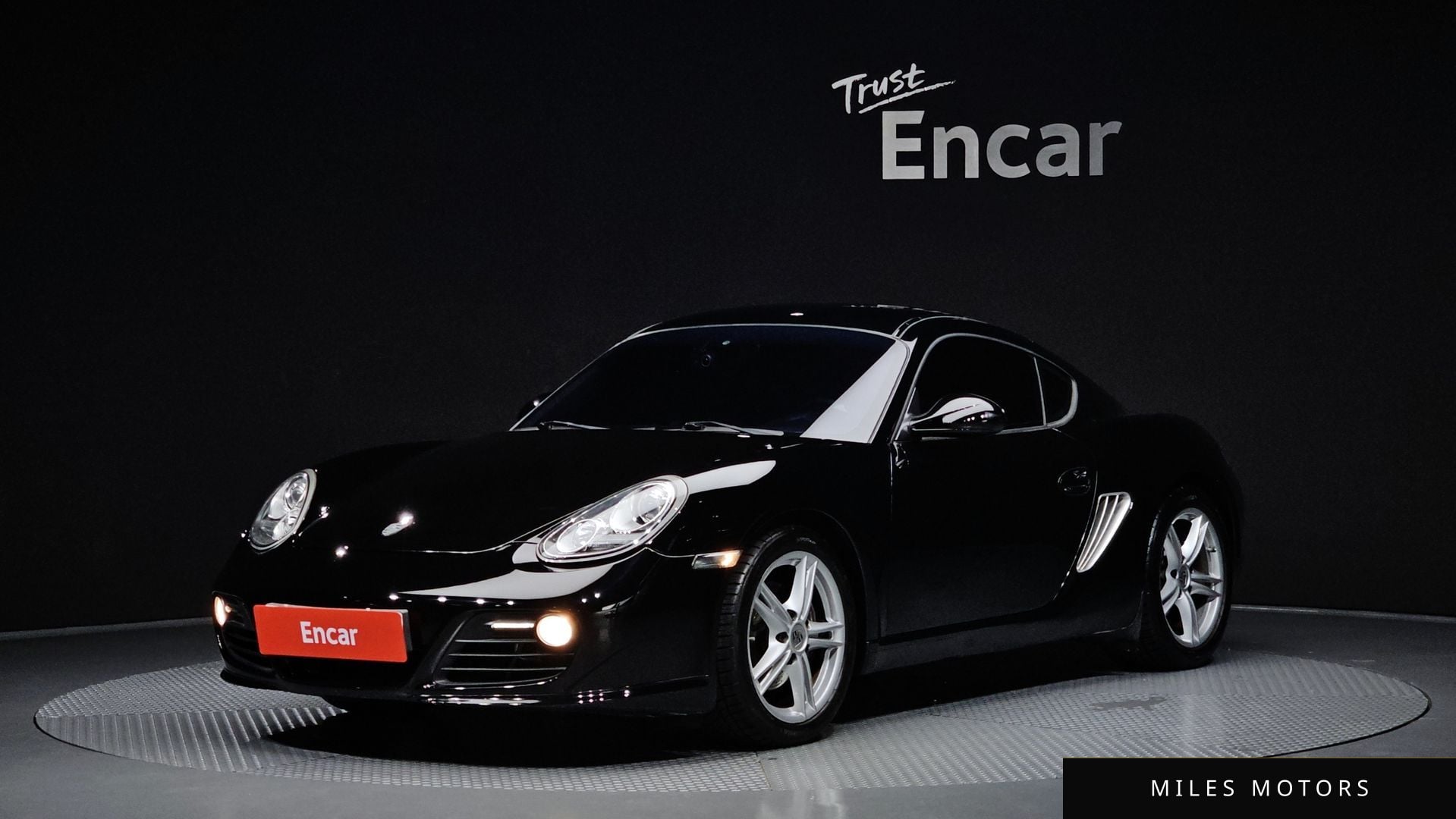 Porsche Cayman 2010 — фото 1 из 12