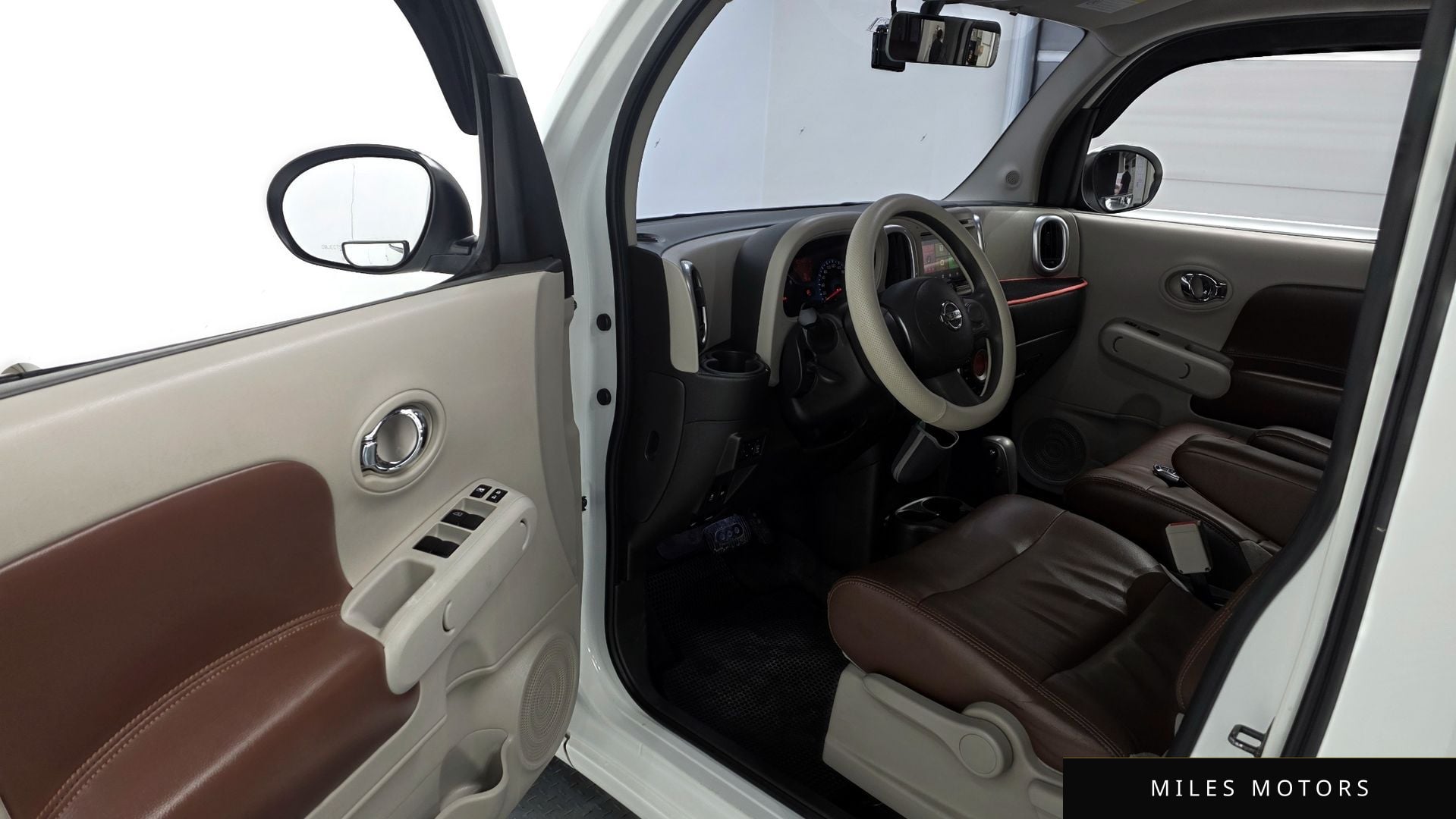 Nissan Cube 2014 — миниатюра 10