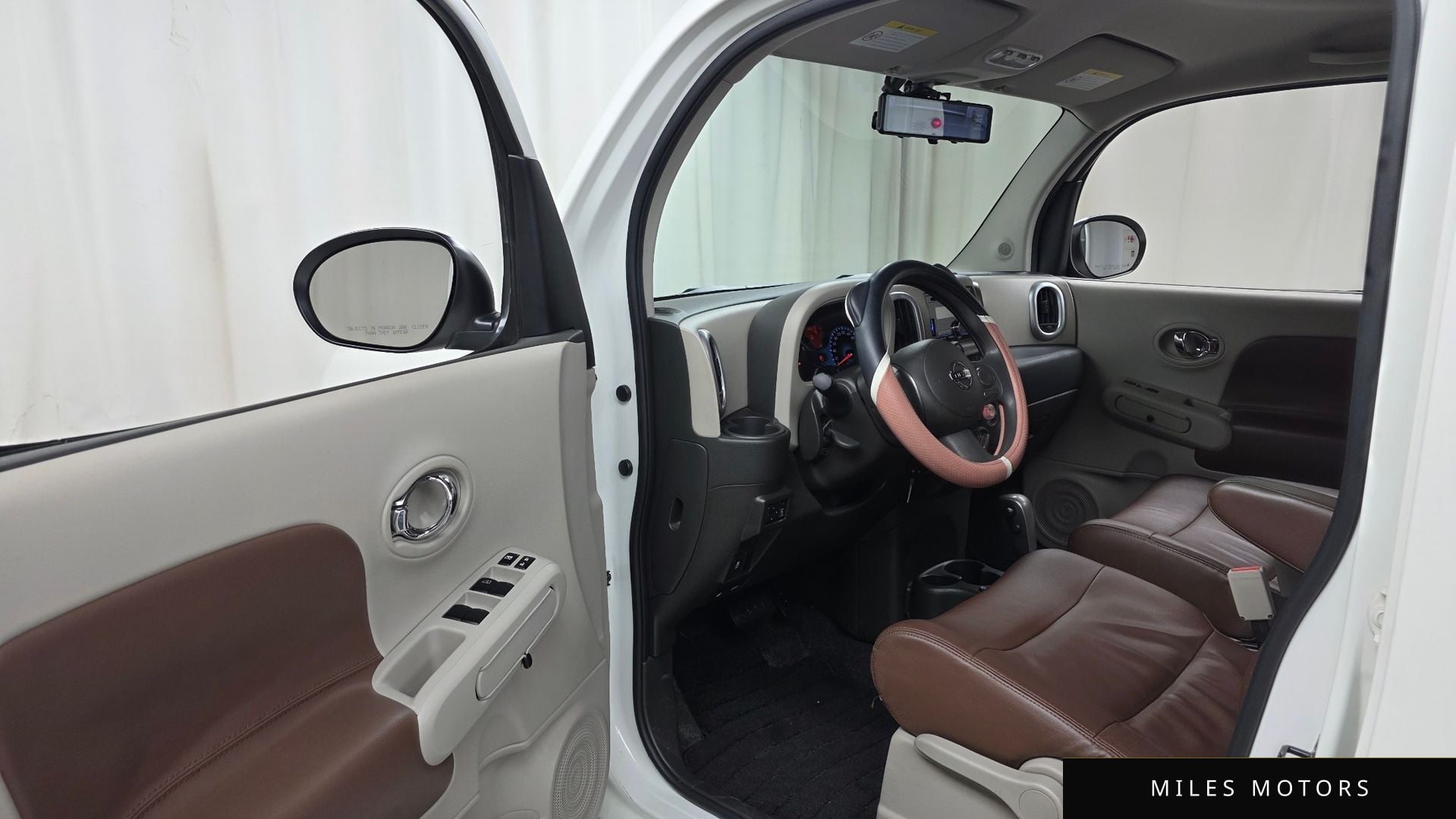 Nissan Cube 2014 — миниатюра 10