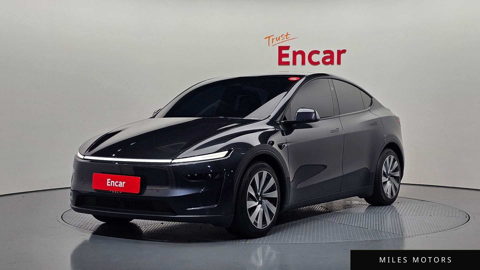 Tesla Model Y 2025 — фото 1 из 12