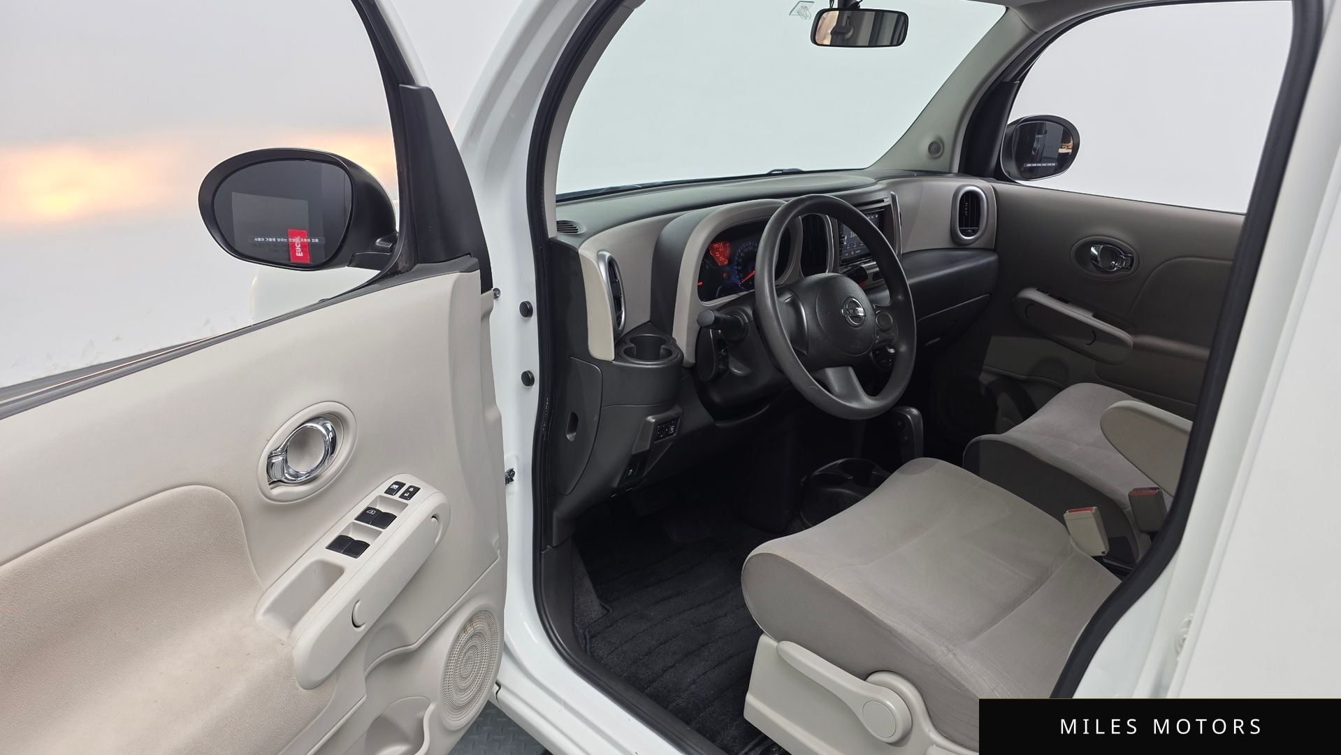 Nissan Cube 2014 — миниатюра 10