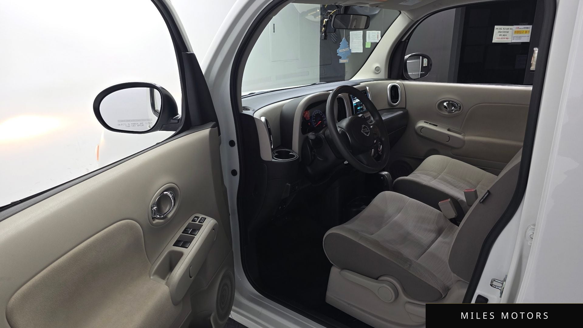 Nissan Cube 2014 — миниатюра 10