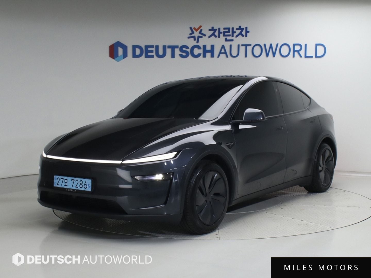 Tesla Model Y 2025 — фото 1 из 12