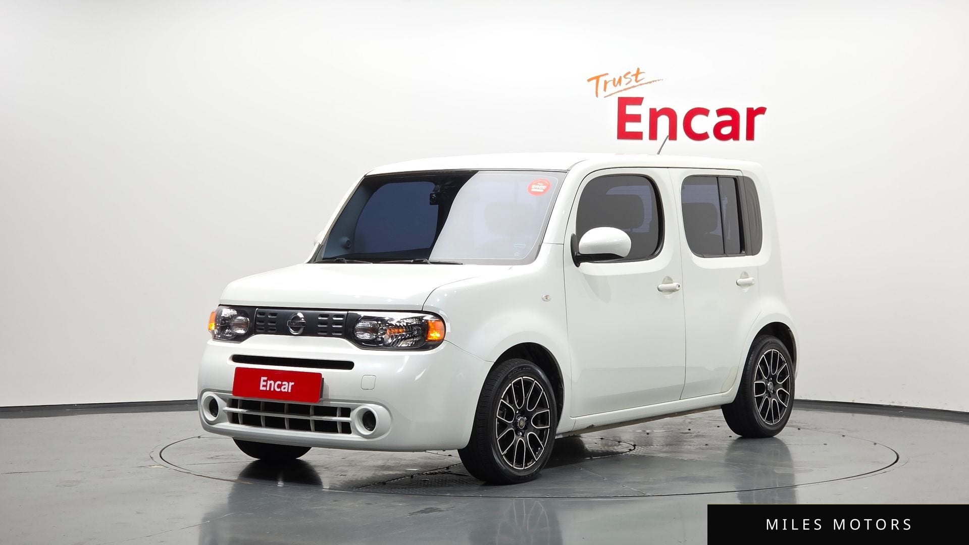Nissan Cube 2013 — фото 1 из 12