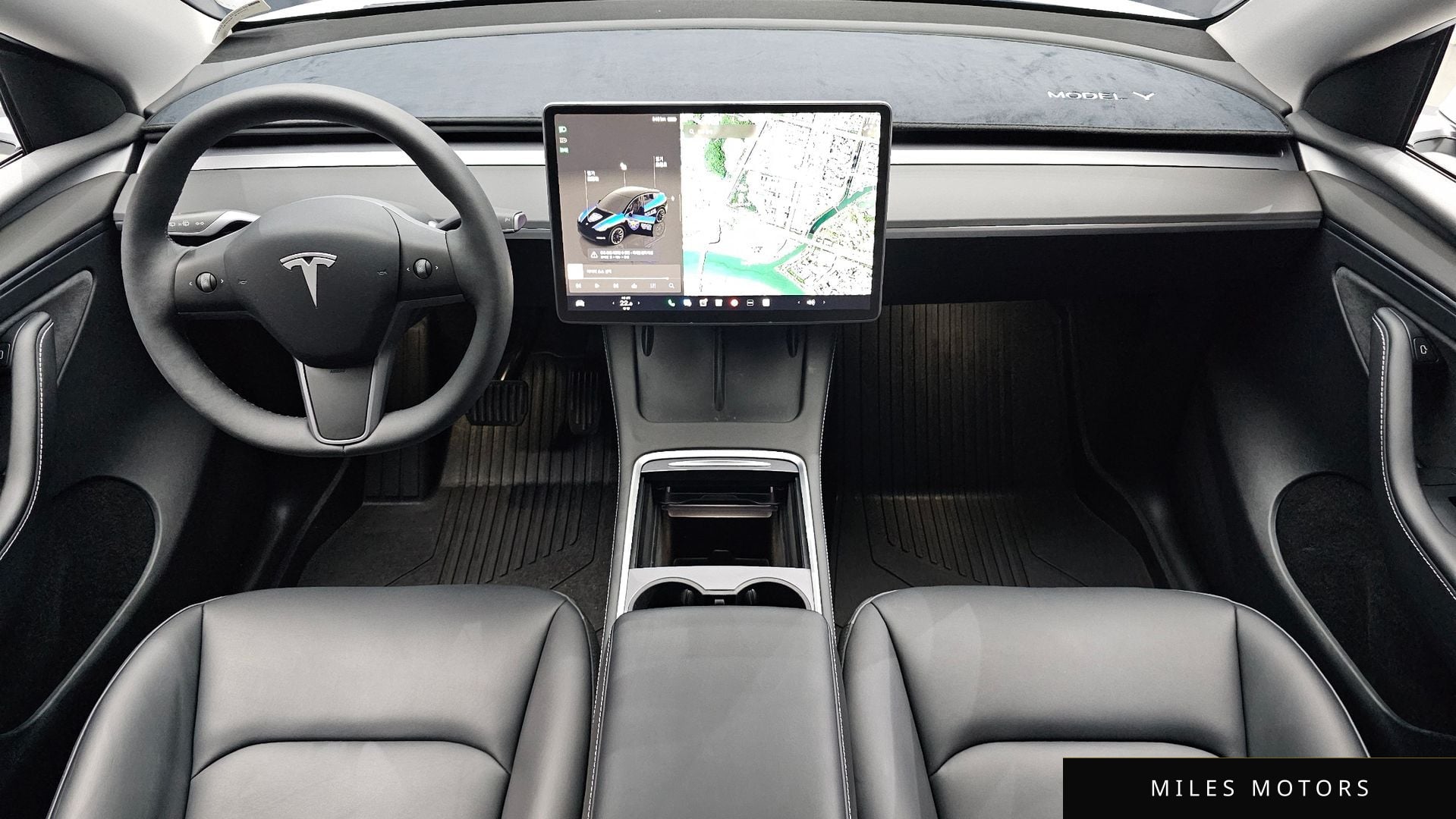 Tesla Model Y 2024 — миниатюра 10