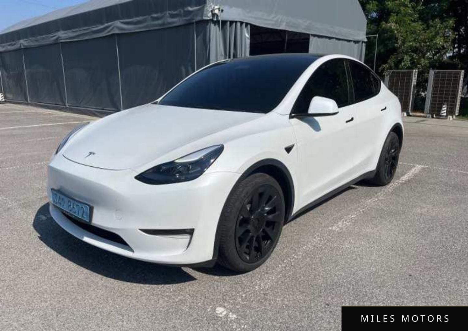 Tesla Model Y 2023 — миниатюра 2